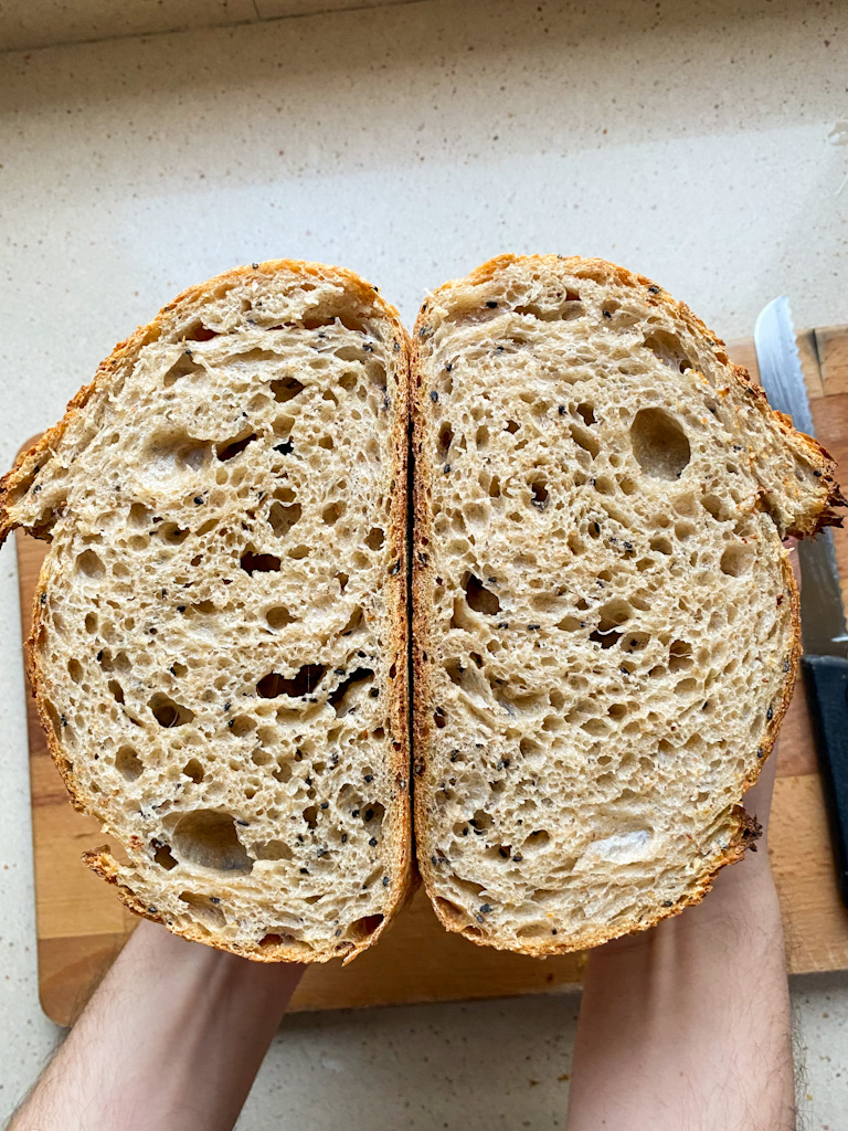 sourdough bread with orange olive oil and sesame seeds.