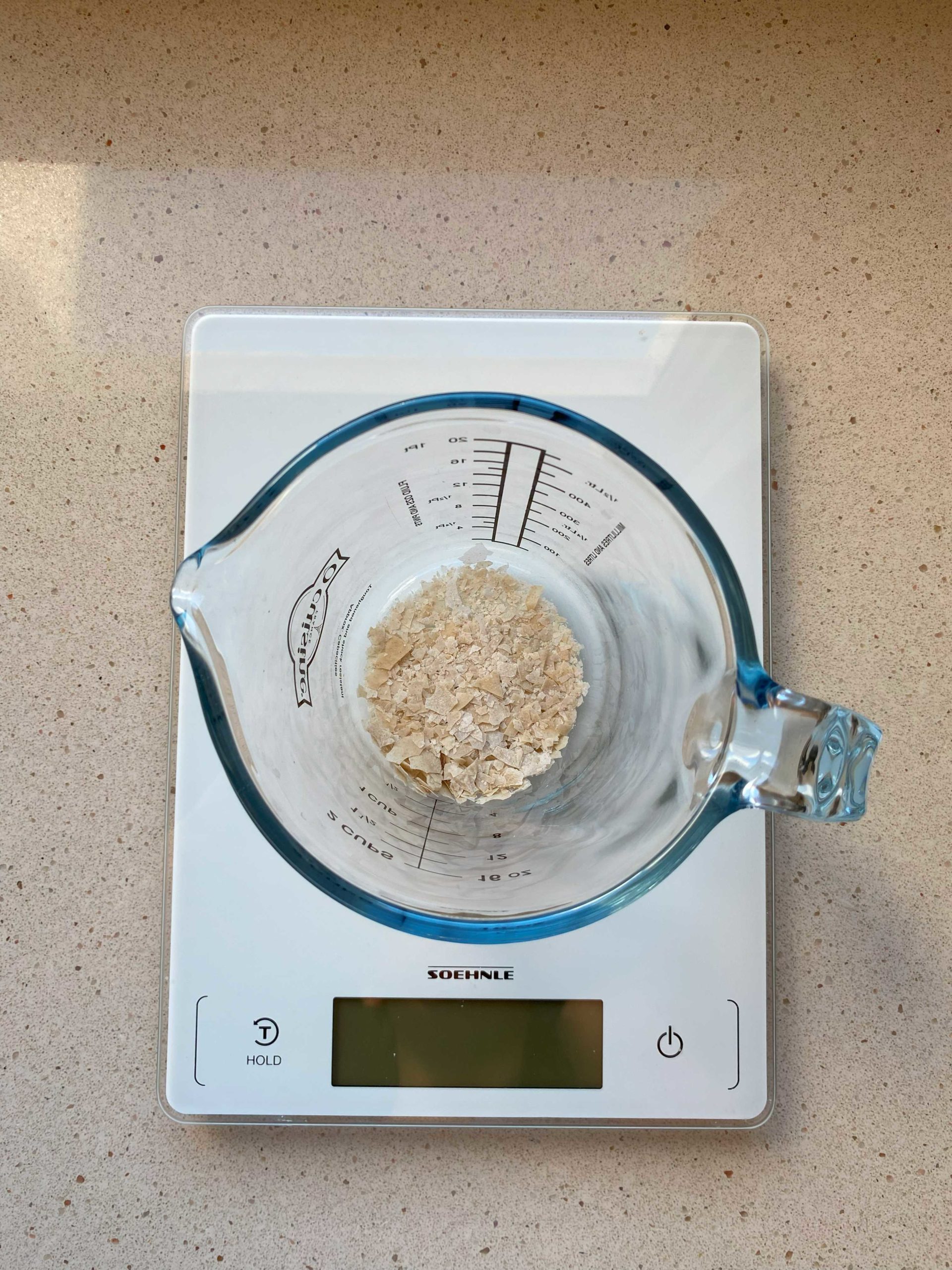 dried sourdough starter that has been crumbled in a jar