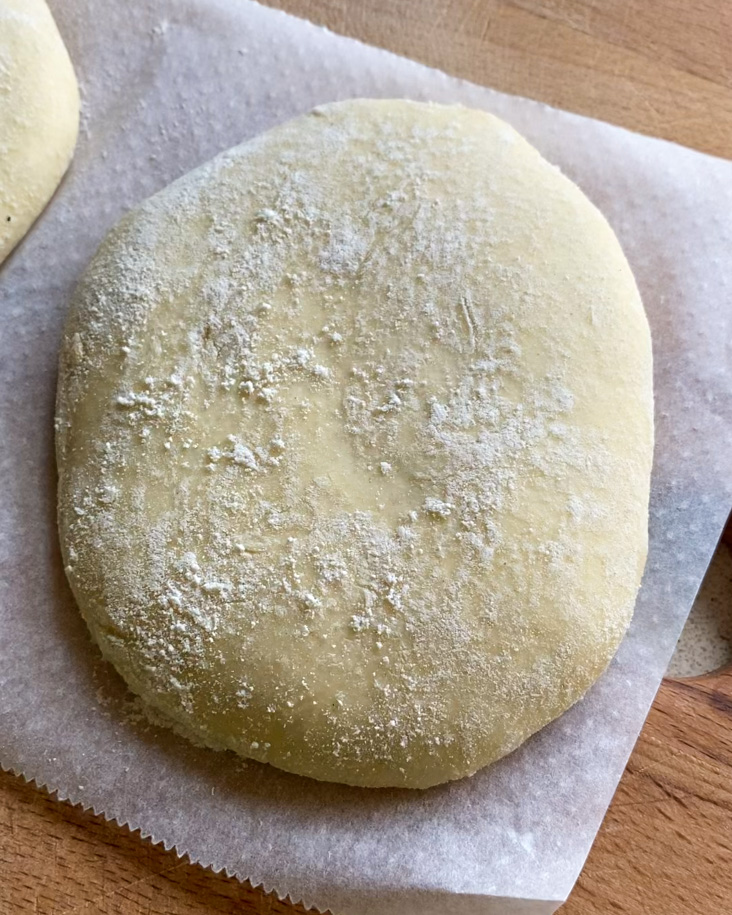 Spanish mollete dough flattened before proofing