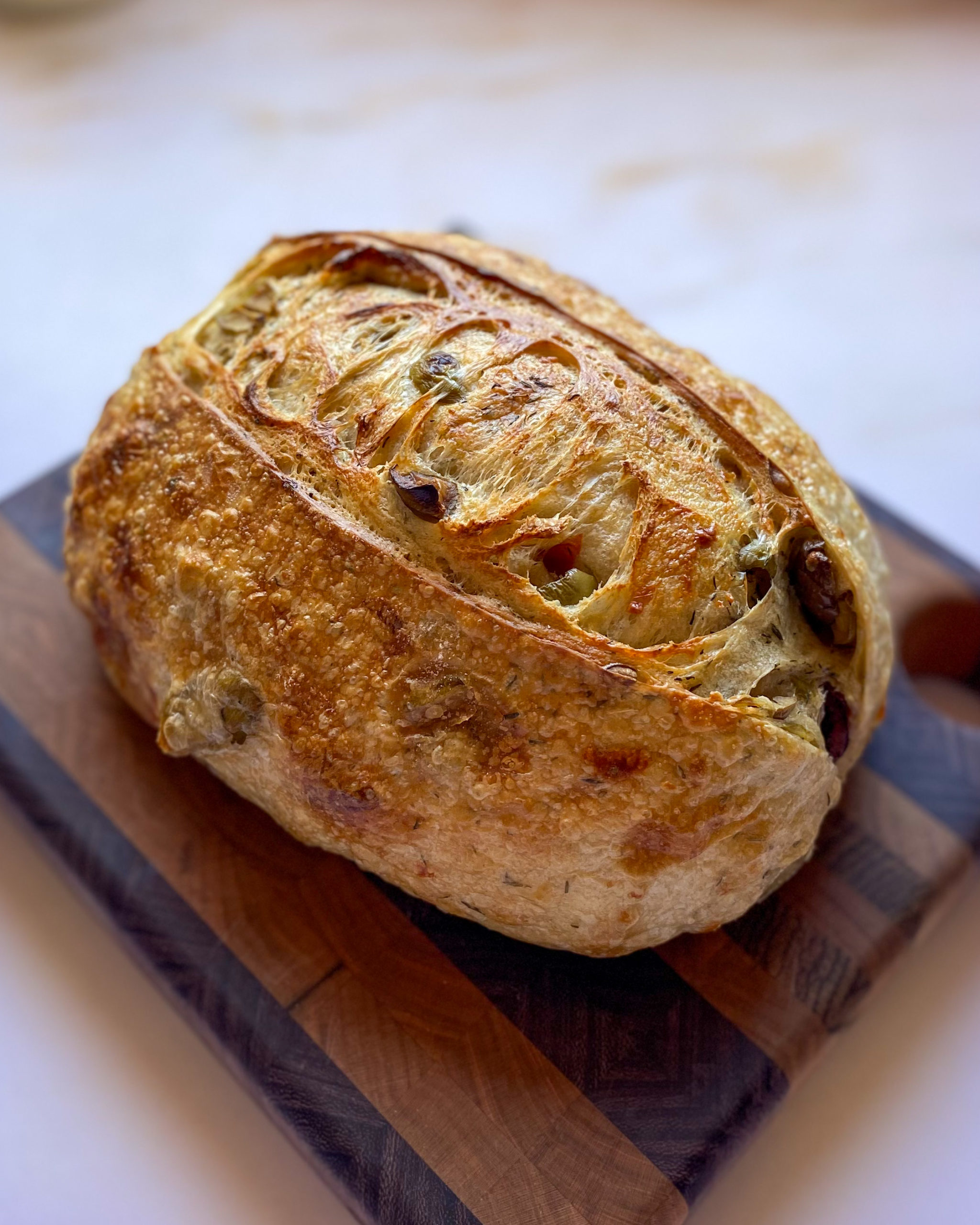 Sourdough bread with olives, Parmesan and thyme